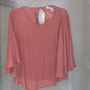 slightly cropped and flowy top.